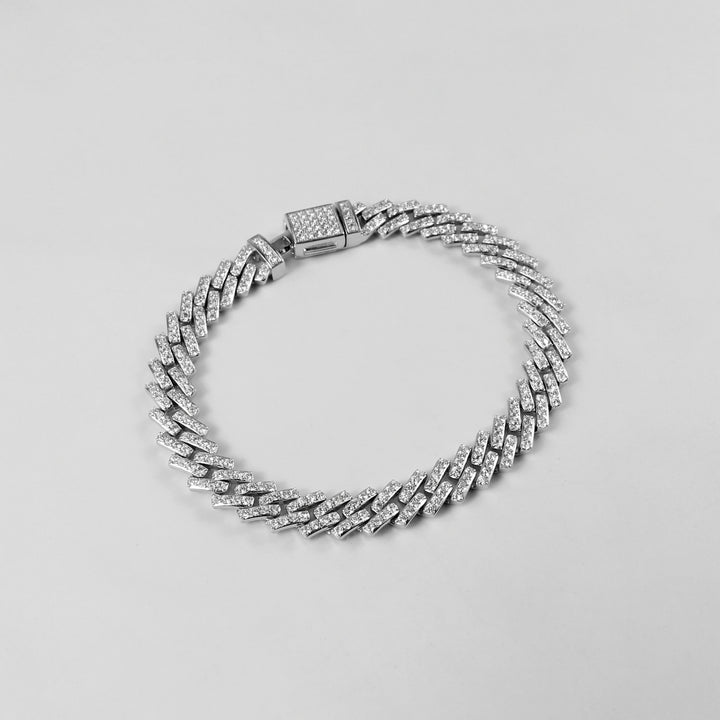 The 'Arctic Blaze' bracelet, crafted from 925 sterling silver, featuring a bold design that combines the icy brilliance of the Arctic with a fiery, radiant glow.