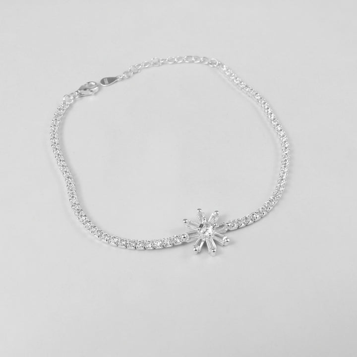 The 'Celestia Stone' bracelet, crafted from 925 sterling silver, featuring a radiant design with a central stone that evokes the ethereal beauty of the cosmos.