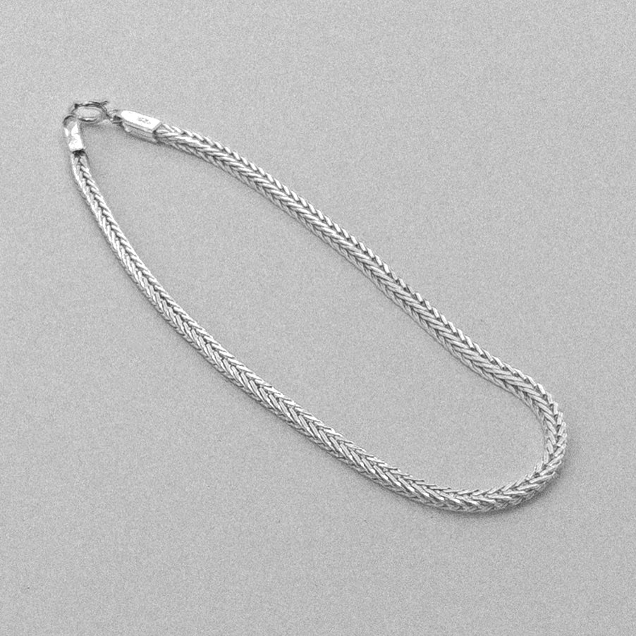 Foxtail Bracelet - A sophisticated 925 sterling silver bracelet by GetTheJuice, featuring a delicate and intricate foxtail weave that adds a refined touch to any wrist.