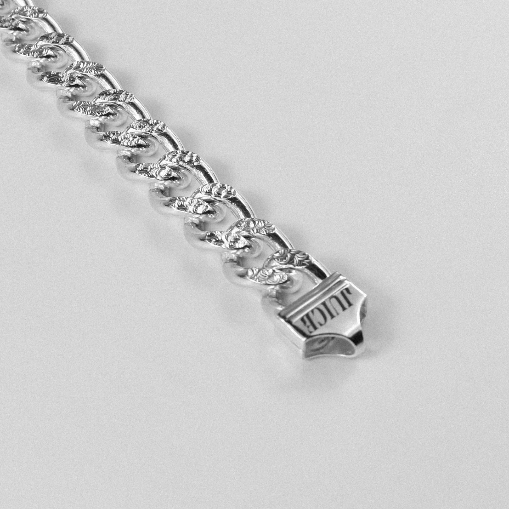 Frosted Fusion Cuban Bracelet - A unique 925 sterling silver bracelet by GetTheJuice, featuring a frosted Cuban link design that seamlessly blends modern style with timeless elegance.