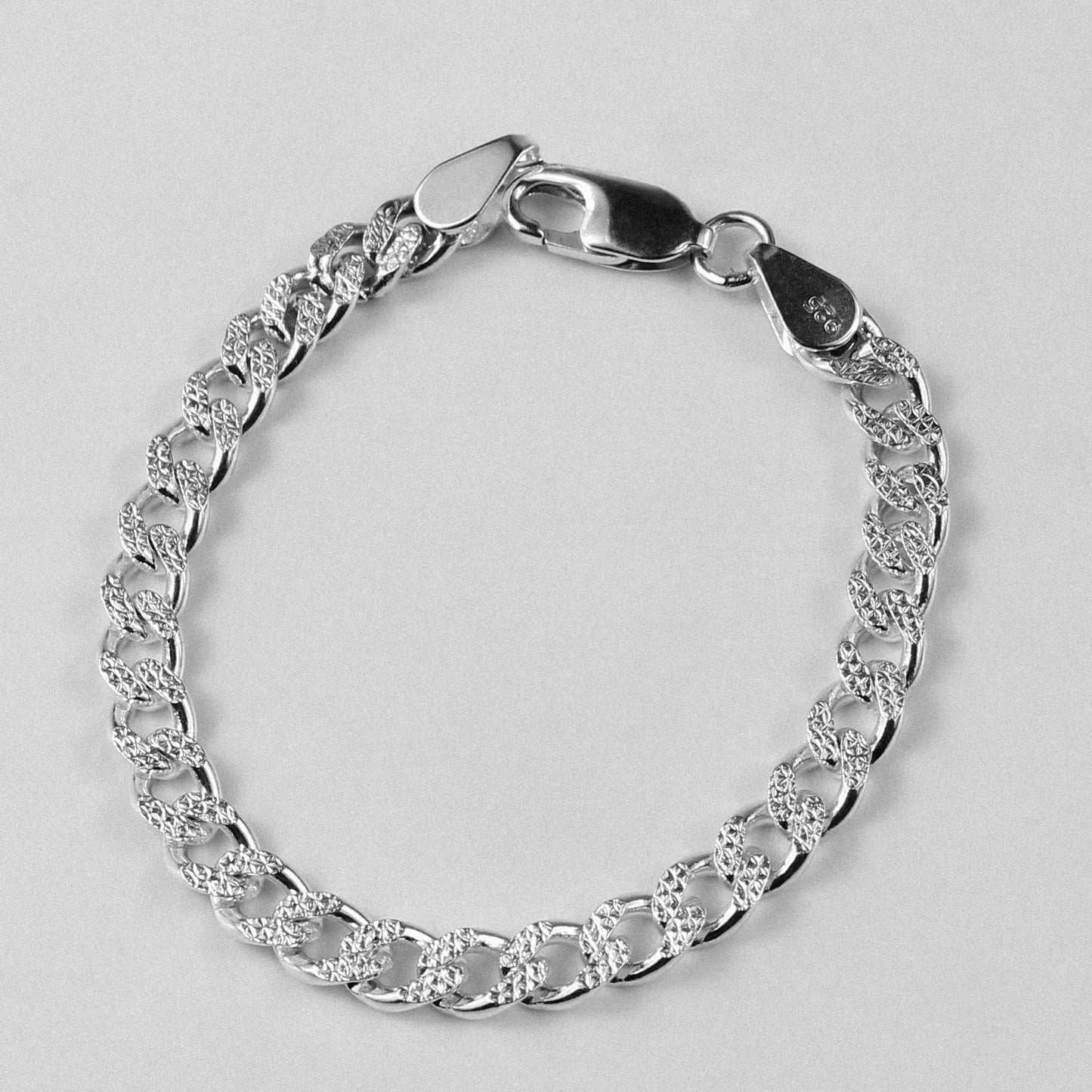 Frosted Fusion Cuban Bracelet - A unique 925 sterling silver bracelet by GetTheJuice, featuring a frosted Cuban link design that seamlessly blends modern style with timeless elegance.