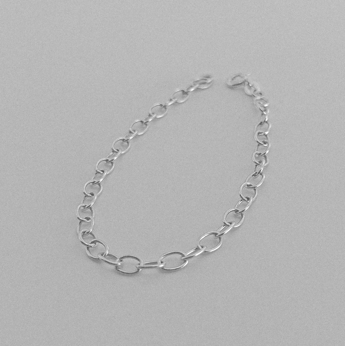 Round Classic Link Bracelet - A sophisticated 925 sterling silver bracelet by GetTheJuice, showcasing an intricate round link design that combines traditional charm with modern style.