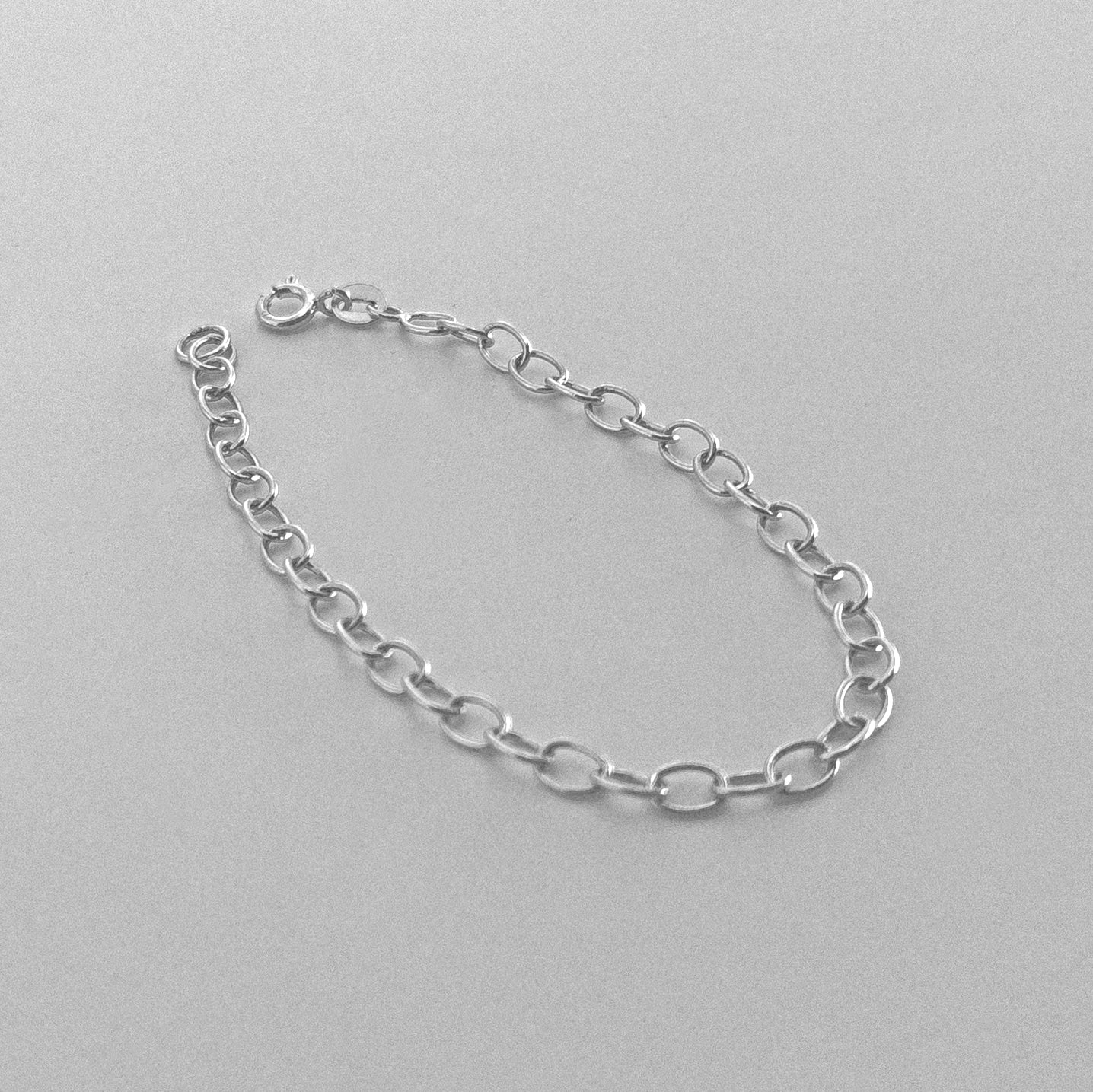 Round Classic Link Bracelet - A sophisticated 925 sterling silver bracelet by GetTheJuice, showcasing an intricate round link design that combines traditional charm with modern style.