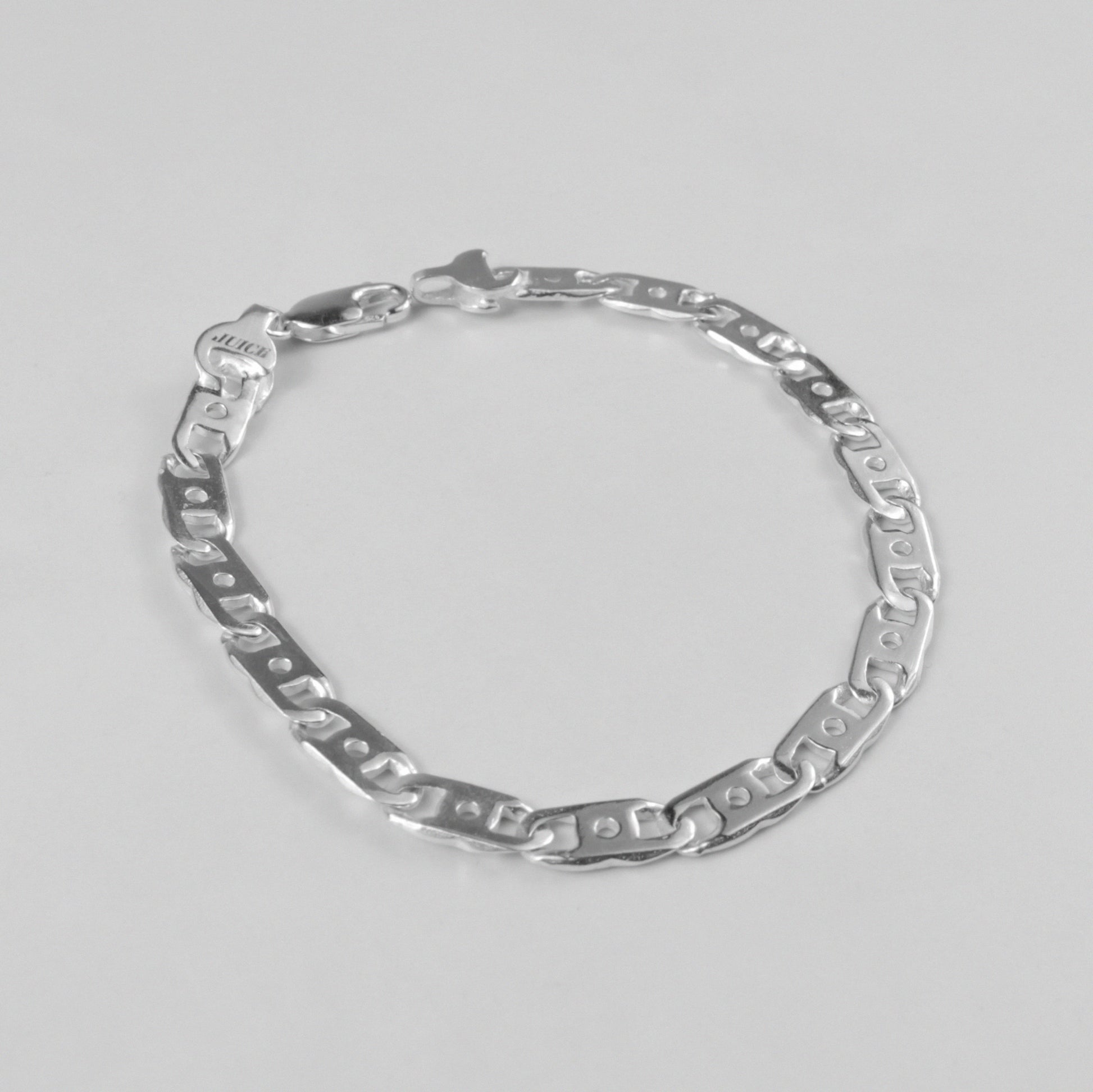 Serrated Bracelet - A striking 925 sterling silver bracelet by GetTheJuice, featuring a unique serrated design that adds an edgy and contemporary flair to any wrist.