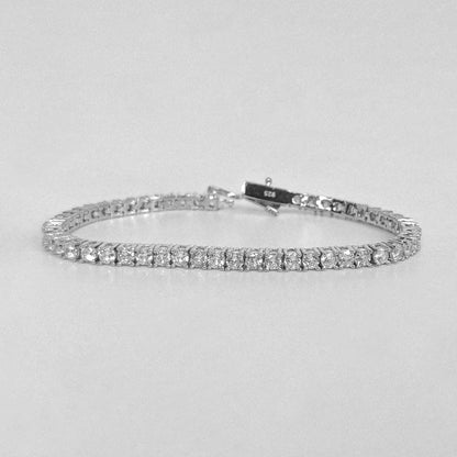 Tennis Bracelet - A classic 925 sterling silver bracelet by GetTheJuice, featuring a continuous row of sparkling stones that add timeless elegance and sophistication to any wrist.