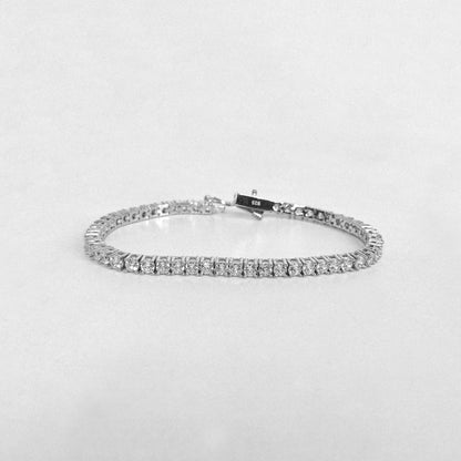 Tennis Bracelet - A classic 925 sterling silver bracelet by GetTheJuice, featuring a continuous row of sparkling stones that add timeless elegance and sophistication to any wrist.