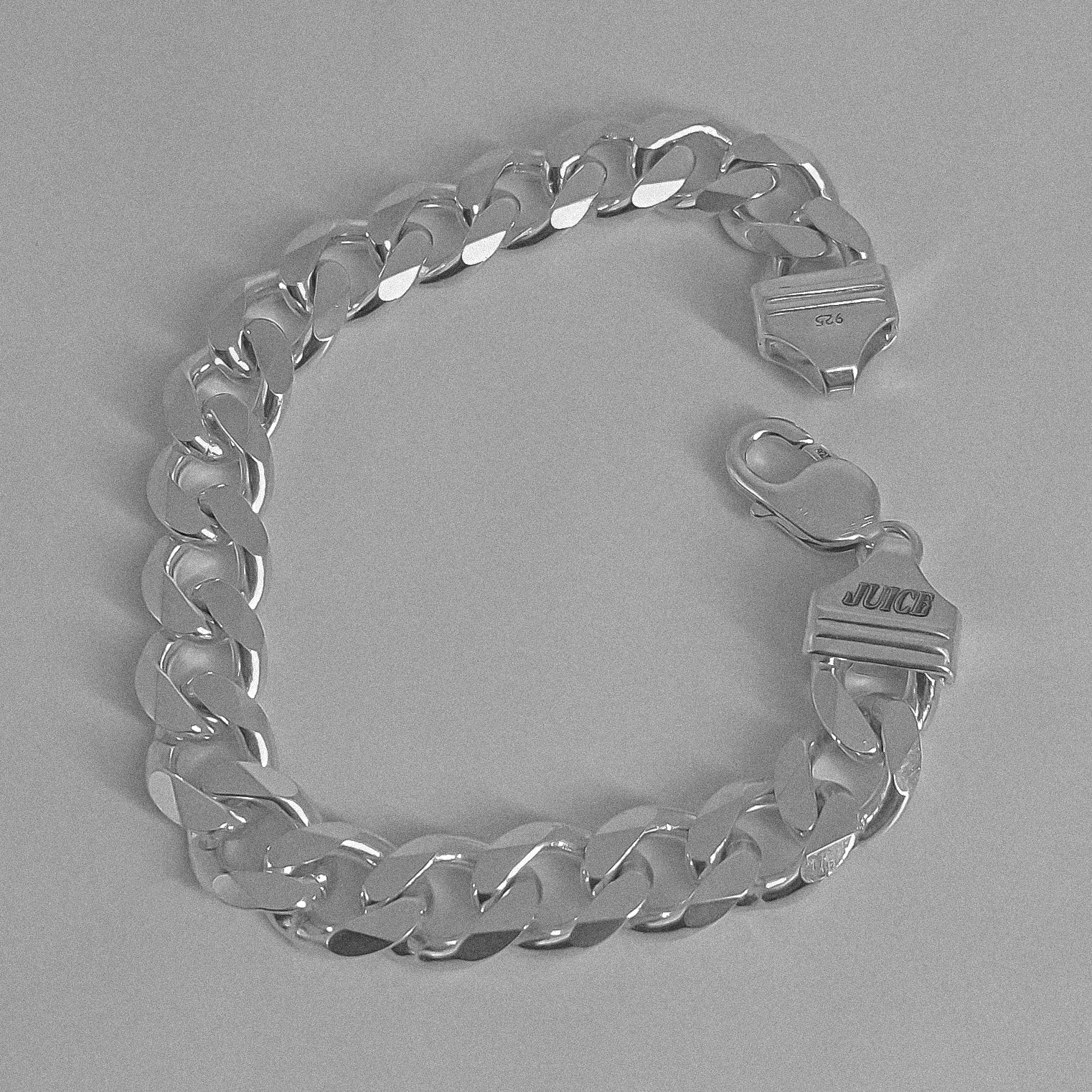 Thick Cuban Link Bracelet - A bold 925 sterling silver bracelet by GetTheJuice, featuring robust and substantial Cuban links that make a striking statement and add a touch of rugged elegance to any wrist.