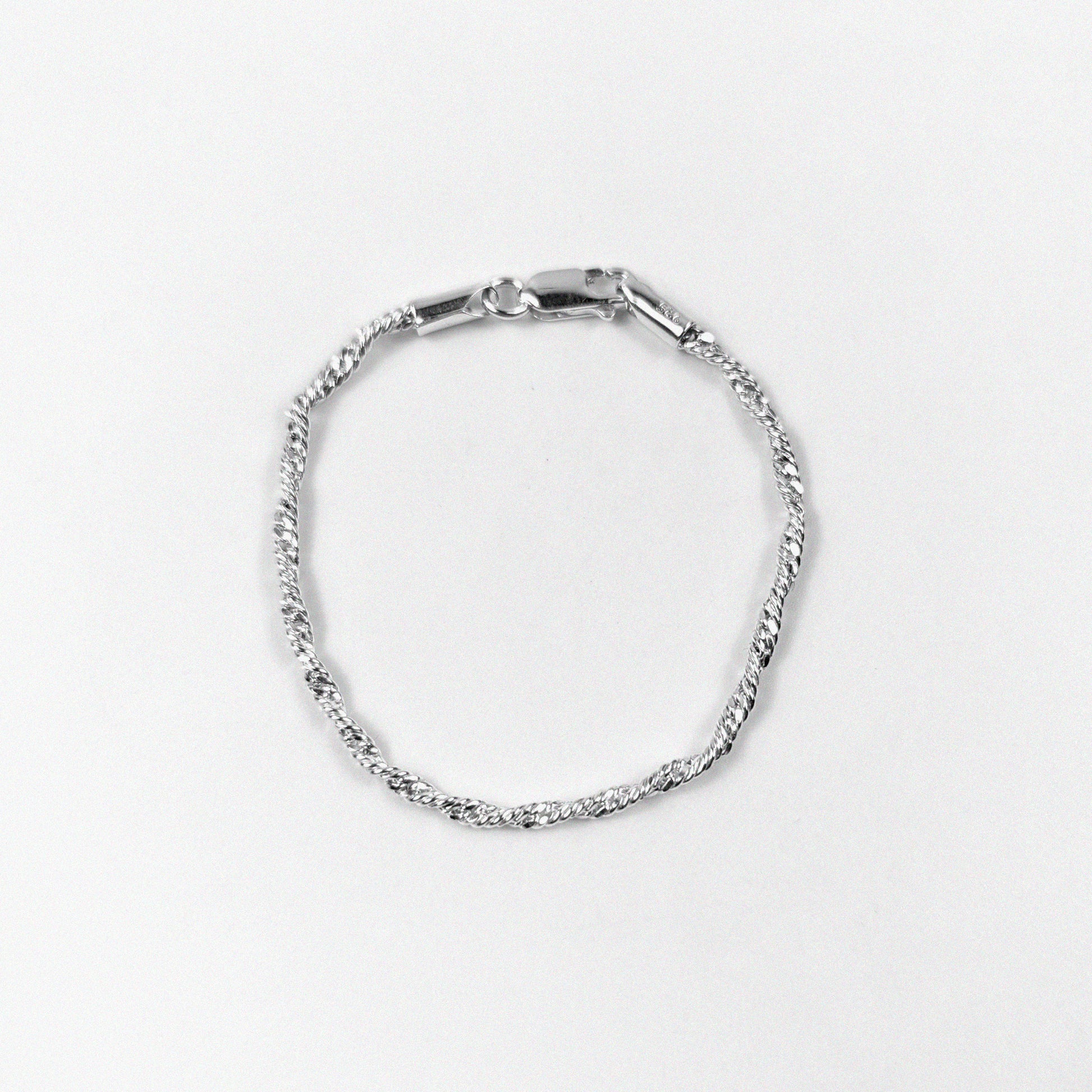 Twisted Rope Bracelet - A sophisticated 925 sterling silver bracelet by GetTheJuice, showcasing a unique twisted rope pattern that combines timeless style with modern sophistication.