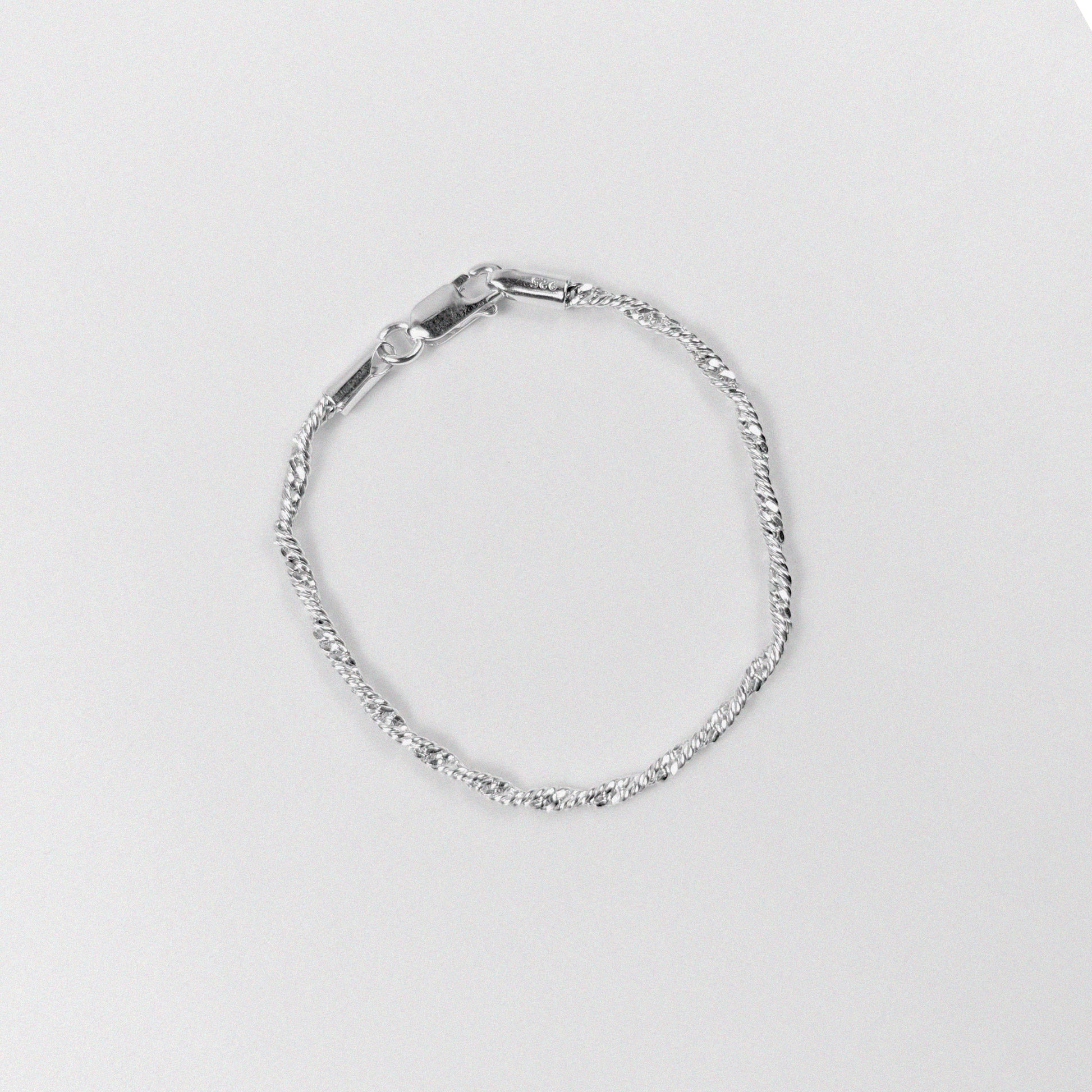 Twisted Rope Bracelet - A sophisticated 925 sterling silver bracelet by GetTheJuice, showcasing a unique twisted rope pattern that combines timeless style with modern sophistication.