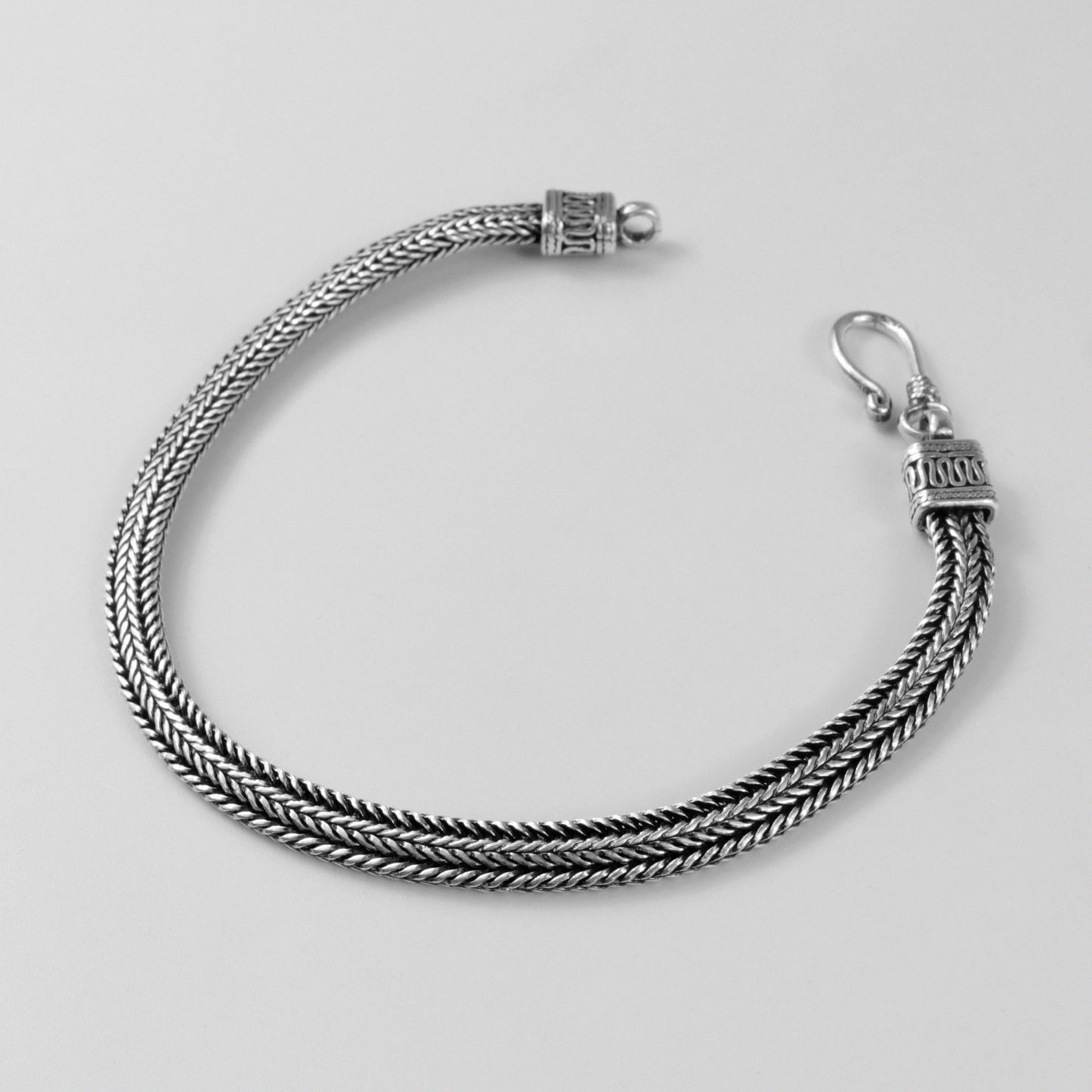 Wheat Weave Bracelet - A refined 925 sterling silver bracelet by GetTheJuice, featuring a delicate wheat weave pattern perfect for adding a touch of timeless charm.