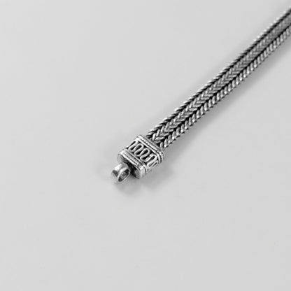 Wheat Weave Bracelet - A refined 925 sterling silver bracelet by GetTheJuice, featuring a delicate wheat weave pattern perfect for adding a touch of timeless charm.