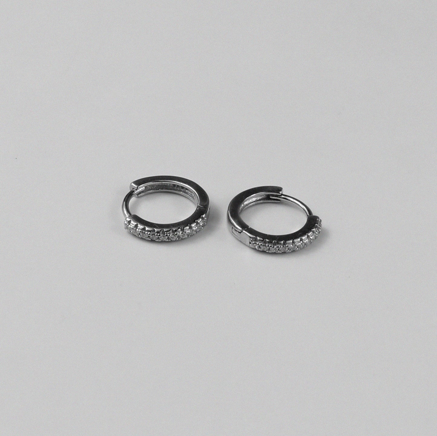 Silverbirch Hoop Earrings - A stunning pair of 925 sterling silver earrings by GetTheJuice, showcasing a refined hoop design with a subtle birch pattern, perfect for adding a hint of nature-inspired sophistication to your ensemble.