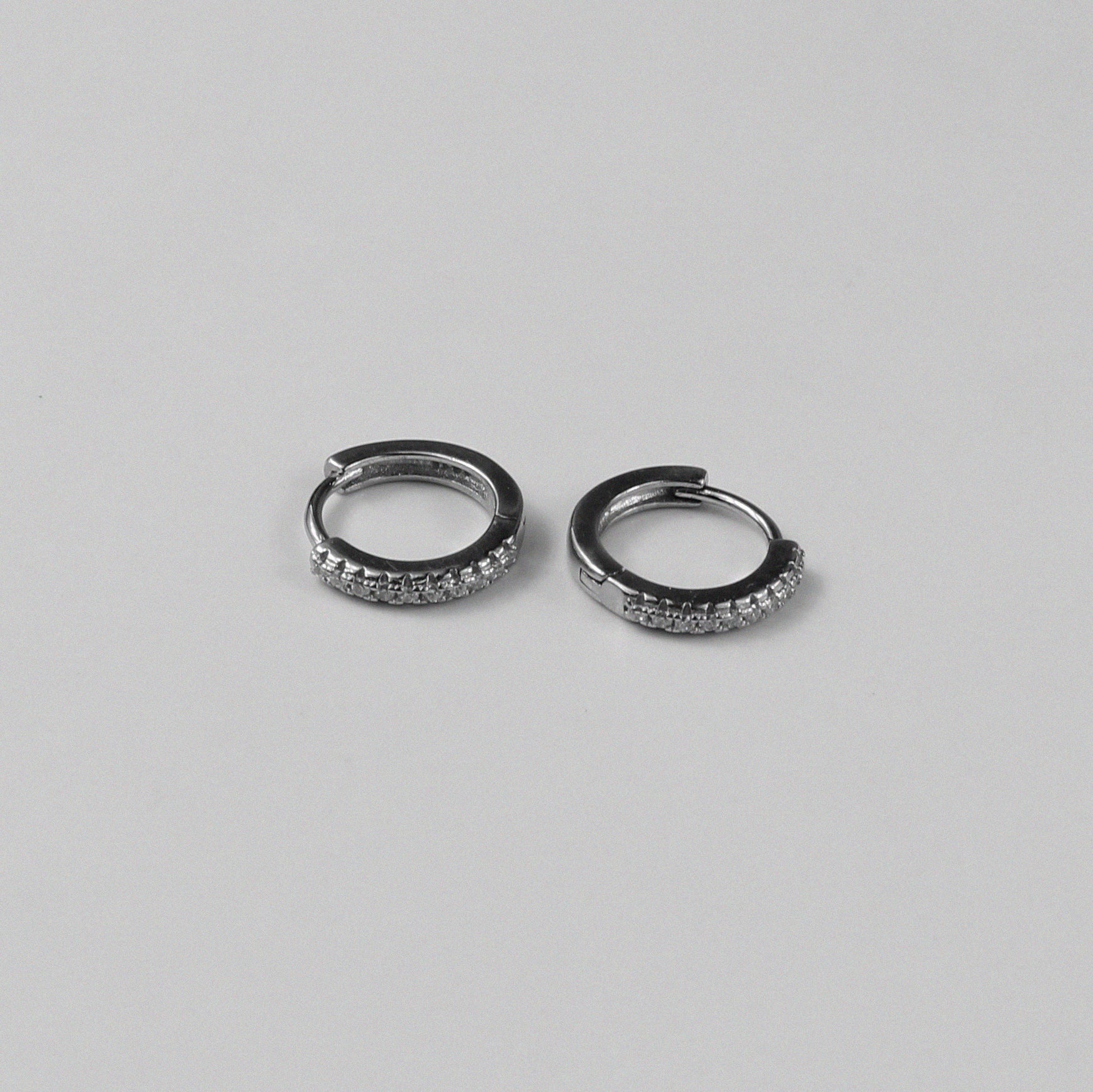 Silverbirch Hoop Earrings - A stunning pair of 925 sterling silver earrings by GetTheJuice, showcasing a refined hoop design with a subtle birch pattern, perfect for adding a hint of nature-inspired sophistication to your ensemble.