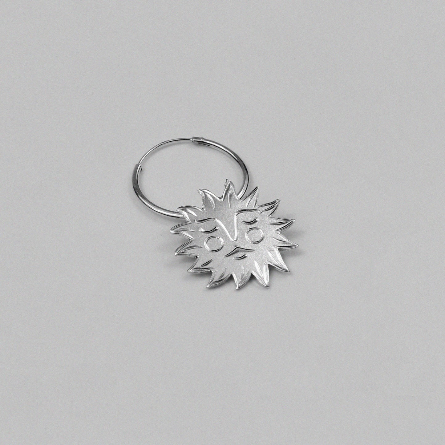 Soleil Earrings - An exquisite pair of 925 sterling silver earrings by GetTheJuice, with a beautiful sun design that captures the warmth and brilliance of the sun, enhancing any outfit with a touch of radiant charm.