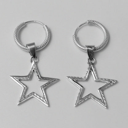 Starlight Earrings - An exquisite pair of 925 sterling silver earrings by GetTheJuice, with a captivating star design that captures the beauty of the night sky, making them a brilliant addition to any jewelry collection.