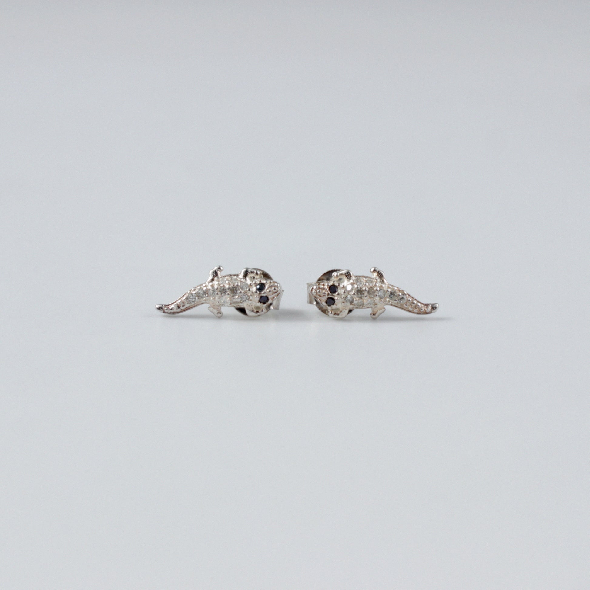 Crocodile Luxe Ear Studs - An exquisite pair of 925 sterling silver ear studs by GetTheJuice, with a refined crocodile design that combines luxury and a hint of the exotic, enhancing any ensemble with a touch of distinction.