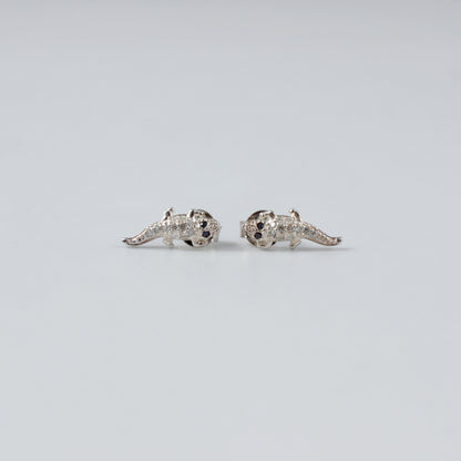 Crocodile Luxe Ear Studs - An exquisite pair of 925 sterling silver ear studs by GetTheJuice, with a refined crocodile design that combines luxury and a hint of the exotic, enhancing any ensemble with a touch of distinction.