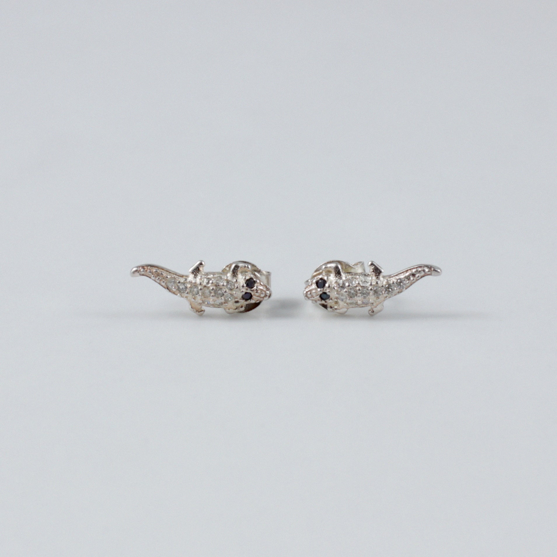 Crocodile Luxe Ear Studs - An exquisite pair of 925 sterling silver ear studs by GetTheJuice, with a refined crocodile design that combines luxury and a hint of the exotic, enhancing any ensemble with a touch of distinction.