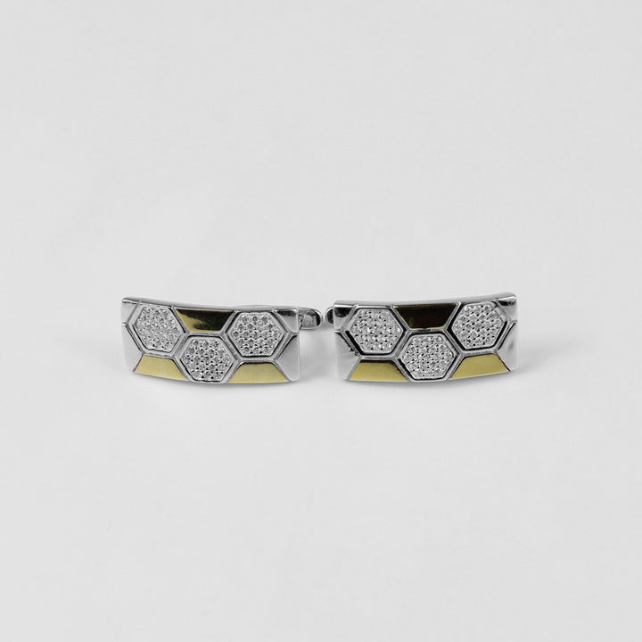 A pair of sleek 925 sterling silver ear studs featuring a geometric hexagonal motif, inspired by lunar elegance. These modern and versatile studs add a touch of celestial sophistication to any outfit.