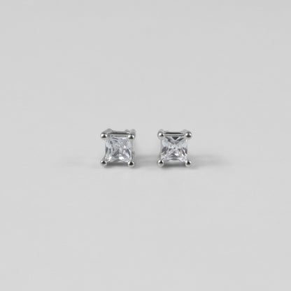 Whimsical White Ear Studs - A stunning pair of 925 sterling silver ear studs by GetTheJuice, showcasing a playful white motif that enhances any ensemble with a hint of lighthearted elegance.