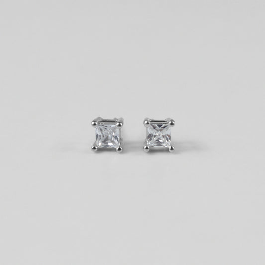 Whimsical White Ear Studs - A stunning pair of 925 sterling silver ear studs by GetTheJuice, showcasing a playful white motif that enhances any ensemble with a hint of lighthearted elegance.