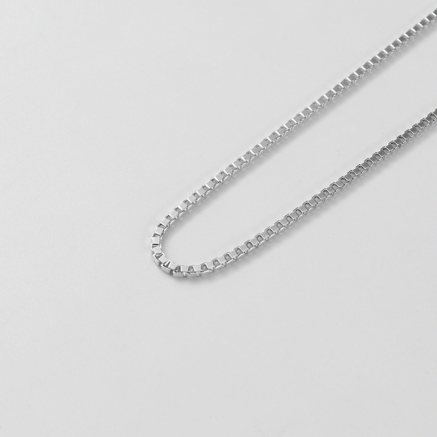 Box Box Necklace" - A stylish and modern 925 sterling silver necklace by GetTheJuice, featuring a distinctive box chain design for a bold and contemporary look. Perfect for everyday wear or special occasions.