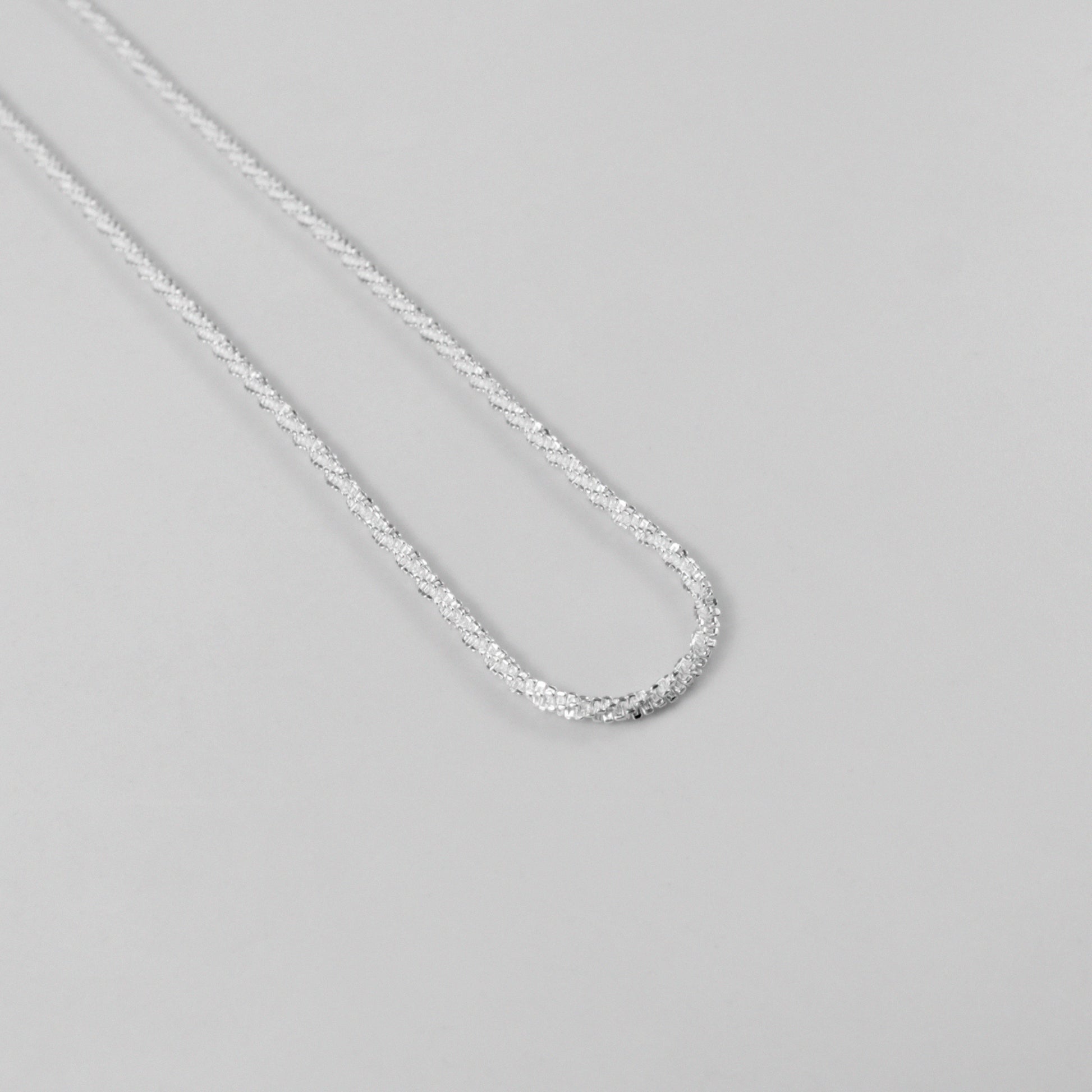 Chic Tightrope Necklace - A stylish 925 sterling silver necklace by GetTheJuice, featuring a sleek and elegant design that adds a touch of sophistication to any outfit.