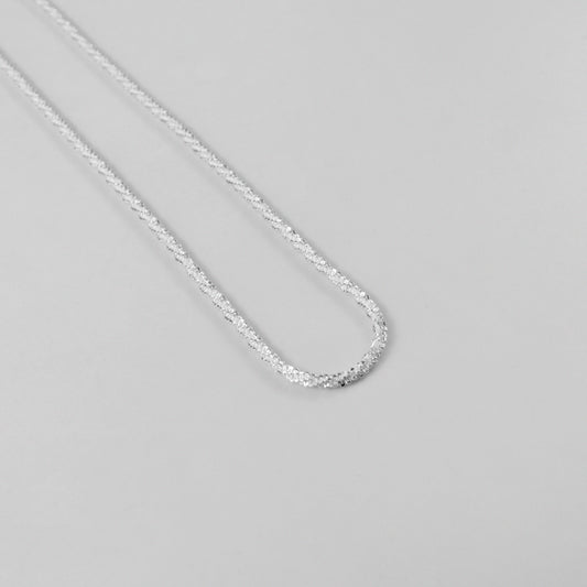 Chic Tightrope Necklace - A stylish 925 sterling silver necklace by GetTheJuice, featuring a sleek and elegant design that adds a touch of sophistication to any outfit.