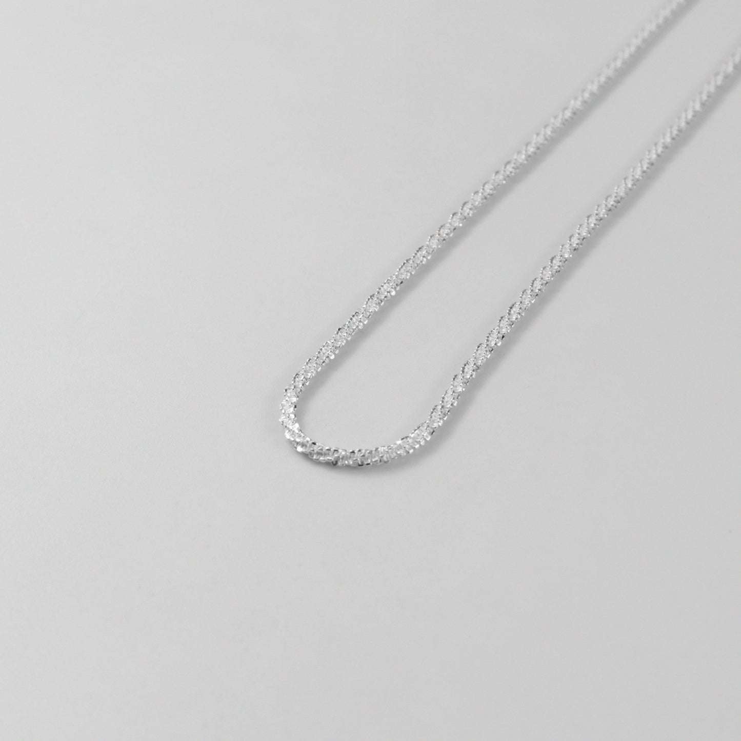 Chic Tightrope Necklace - A stylish 925 sterling silver necklace by GetTheJuice, featuring a sleek and elegant design that adds a touch of sophistication to any outfit.