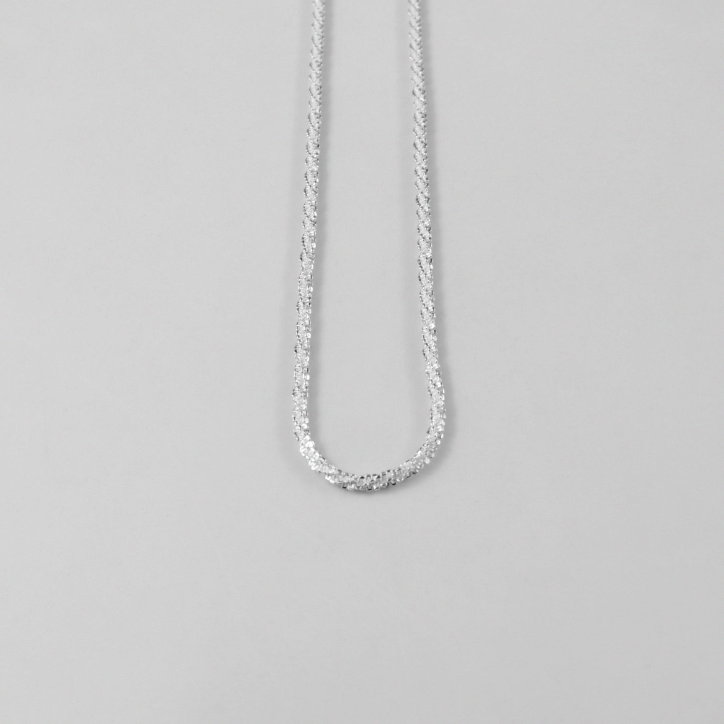 Chic Tightrope Necklace - A stylish 925 sterling silver necklace by GetTheJuice, featuring a sleek and elegant design that adds a touch of sophistication to any outfit.