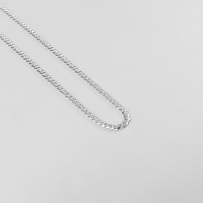 Cuban Necklace - A timeless 925 sterling silver necklace by GetTheJuice, featuring a bold and intricate Cuban link design that adds a touch of sophistication to any outfit.