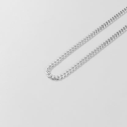 Cuban Necklace - A timeless 925 sterling silver necklace by GetTheJuice, featuring a bold and intricate Cuban link design that adds a touch of sophistication to any outfit.