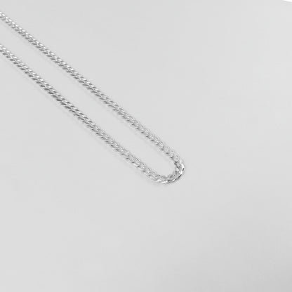 Cuban Necklace - A timeless 925 sterling silver necklace by GetTheJuice, featuring a bold and intricate Cuban link design that adds a touch of sophistication to any outfit.