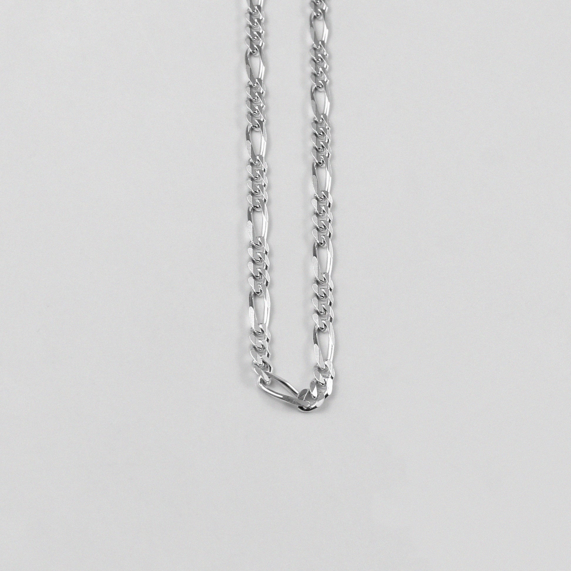 Figaro Necklace - A classic 925 sterling silver necklace by GetTheJuice, featuring the timeless Figaro link design that adds a touch of elegance and sophistication to any outfit.