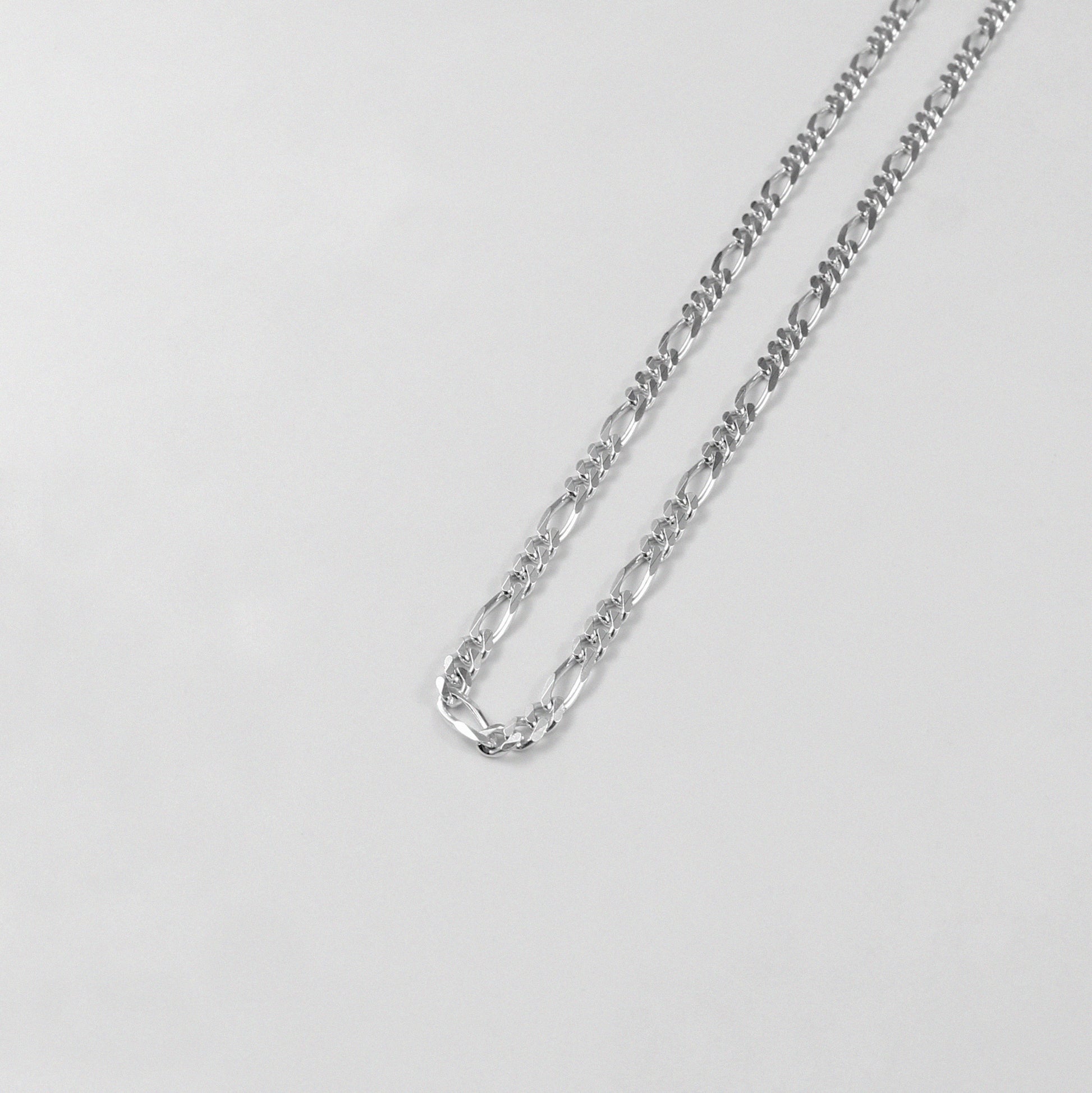 Figaro Necklace - A classic 925 sterling silver necklace by GetTheJuice, featuring the timeless Figaro link design that adds a touch of elegance and sophistication to any outfit.