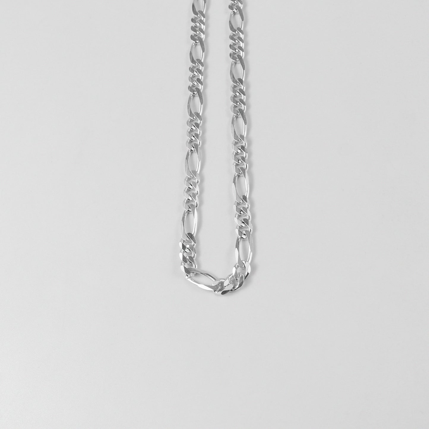 Figaro Necklace - A classic 925 sterling silver necklace by GetTheJuice, featuring the timeless Figaro link design that adds a touch of elegance and sophistication to any outfit.