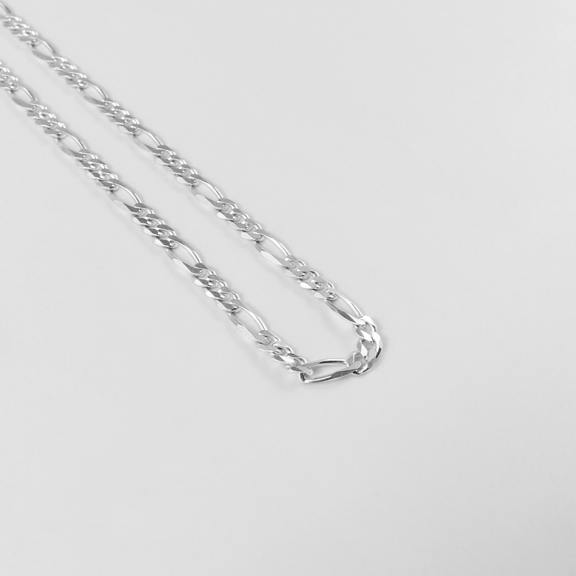 Figaro Necklace - A classic 925 sterling silver necklace by GetTheJuice, featuring the timeless Figaro link design that adds a touch of elegance and sophistication to any outfit.