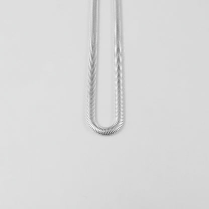 Flat Snake Necklace - A sophisticated 925 sterling silver necklace by GetTheJuice, featuring a sleek flat snake chain design that offers a refined and elegant touch to any ensemble.