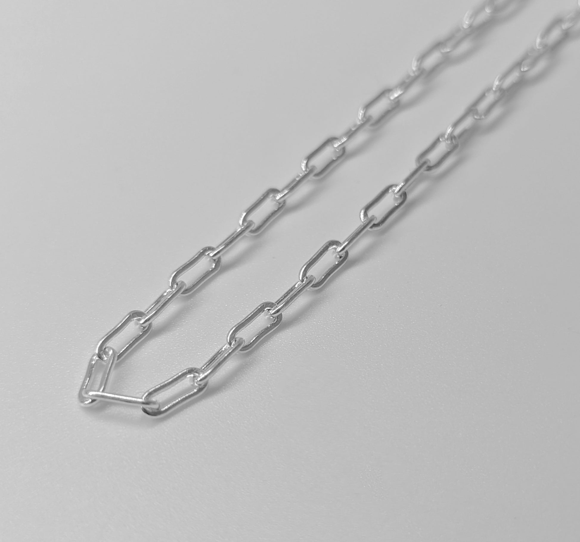 Long Cable Necklace - A sophisticated 925 sterling silver necklace by GetTheJuice, featuring an elegant and elongated cable chain design that complements any style.