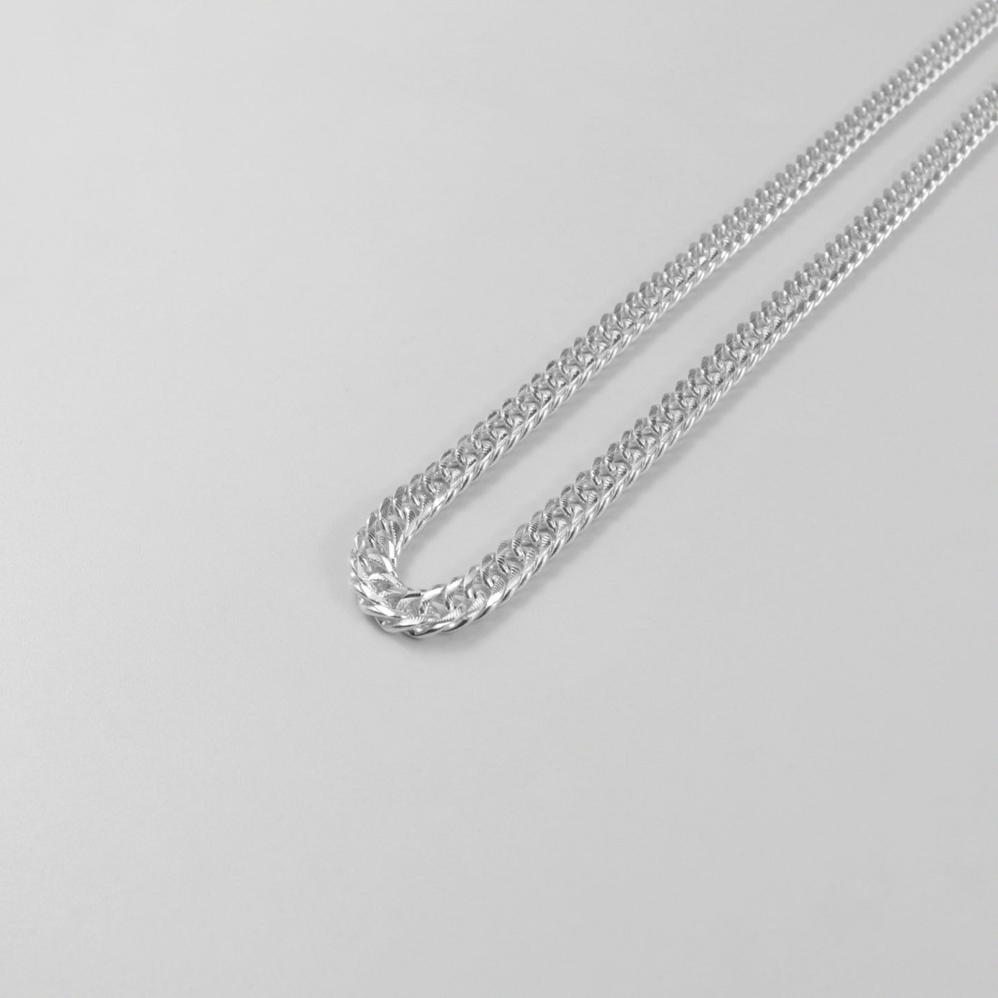 Luxe Cuban Necklace - A luxurious 925 sterling silver necklace by GetTheJuice, featuring an exquisite Cuban link design that offers a refined and elegant touch to any ensemble.