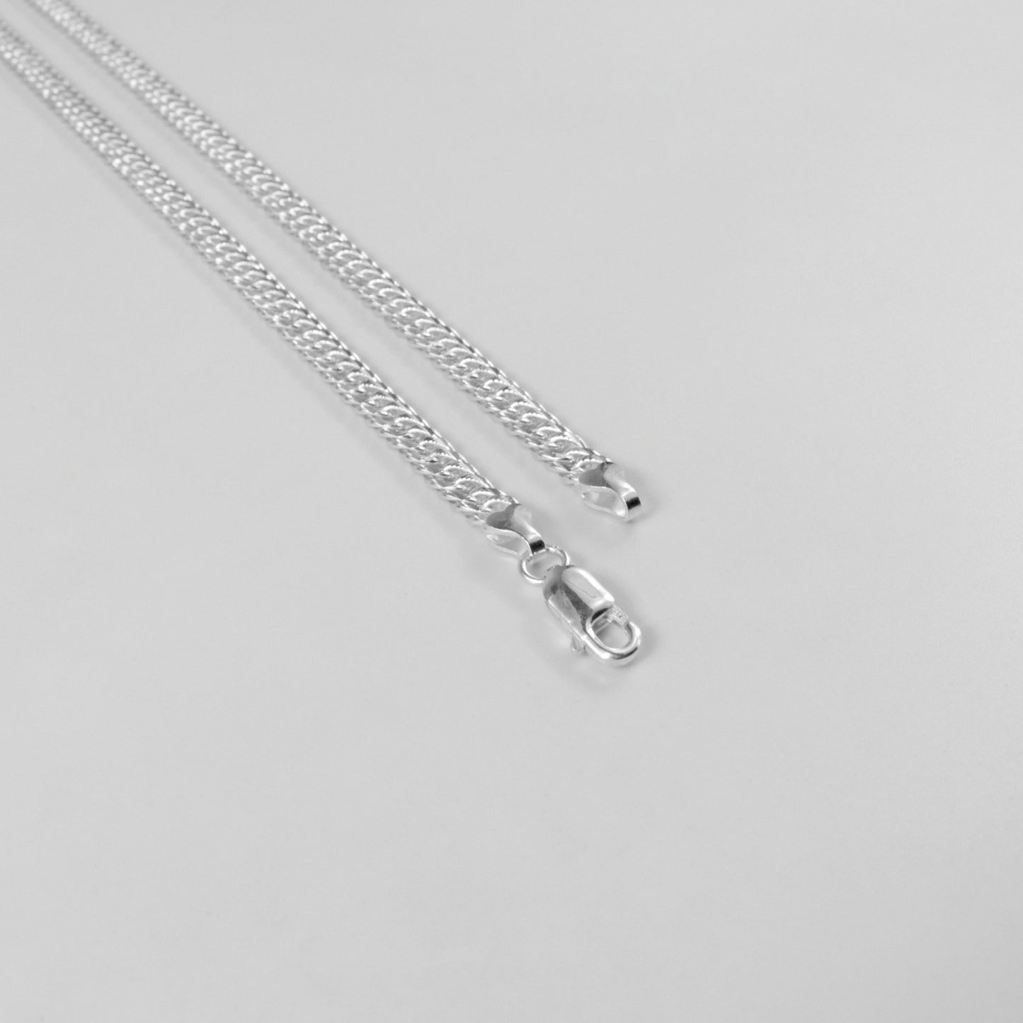 Luxe Cuban Necklace - A luxurious 925 sterling silver necklace by GetTheJuice, featuring an exquisite Cuban link design that offers a refined and elegant touch to any ensemble.