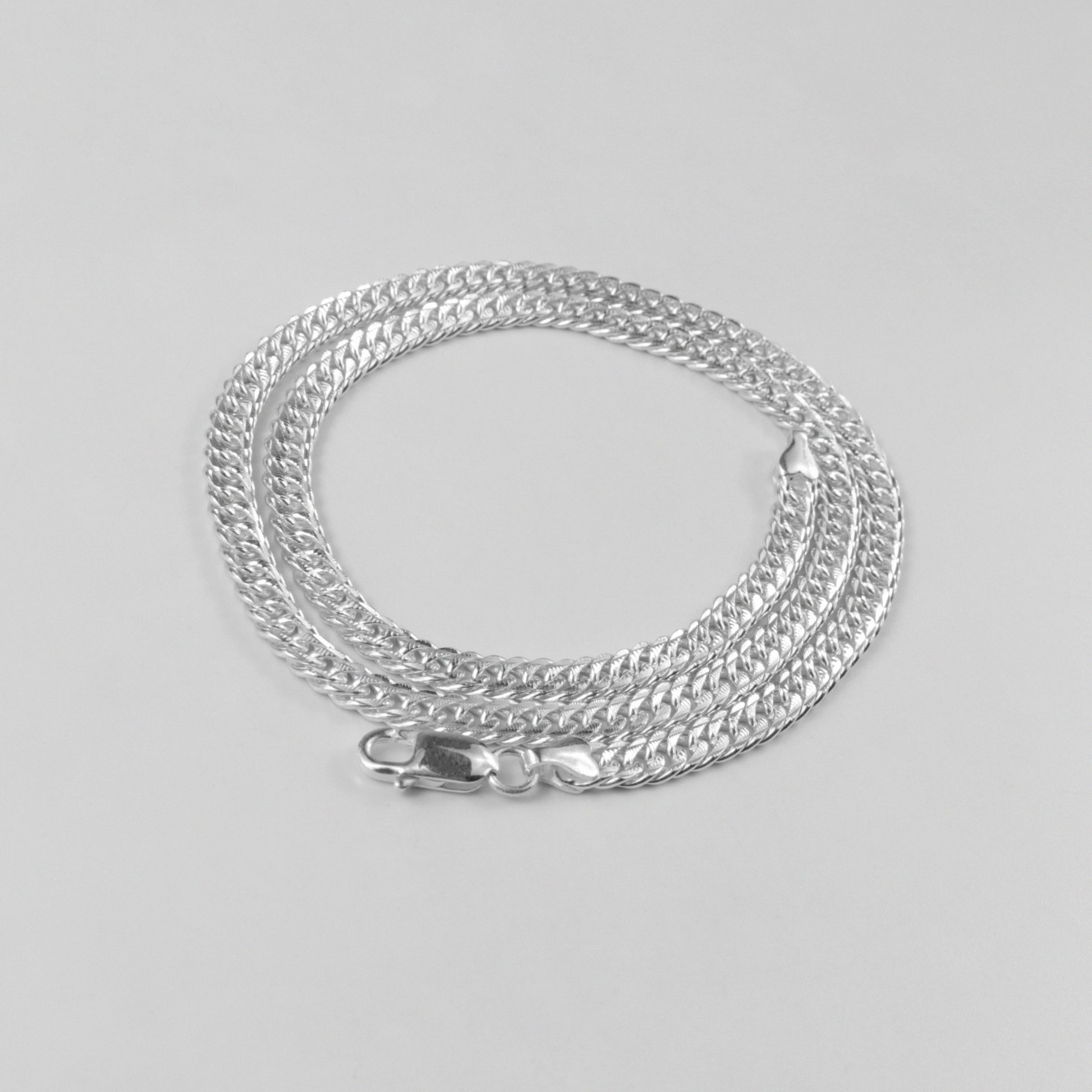 Luxe Cuban Necklace - A luxurious 925 sterling silver necklace by GetTheJuice, featuring an exquisite Cuban link design that offers a refined and elegant touch to any ensemble.