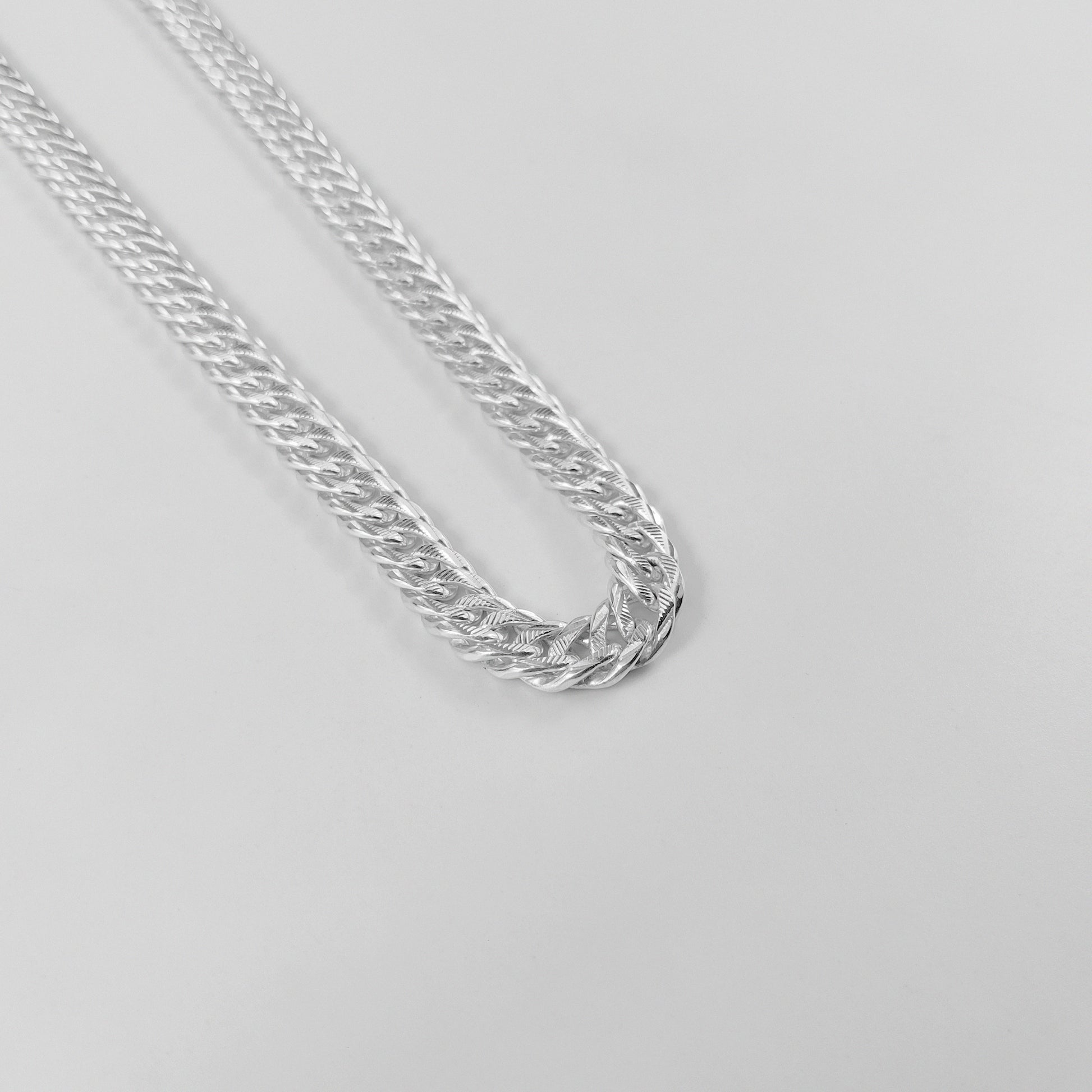 Luxe Cuban Necklace - A luxurious 925 sterling silver necklace by GetTheJuice, featuring an exquisite Cuban link design that offers a refined and elegant touch to any ensemble.