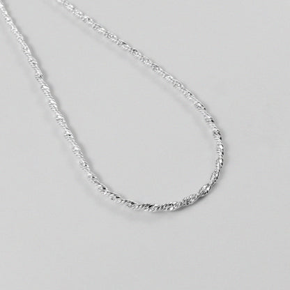 Twisted Rope Necklace - A beautifully crafted 925 sterling silver necklace by GetTheJuice, with a unique twisted rope design that exudes both modernity and tradition.