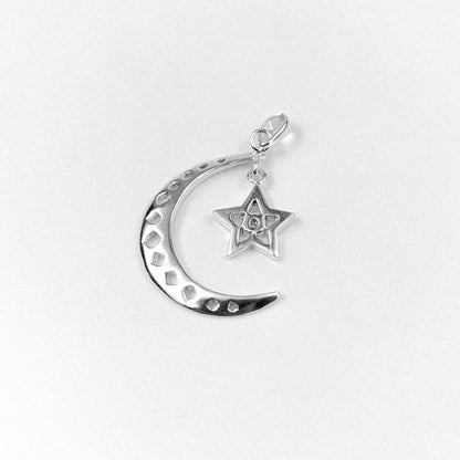 Celestial Charm Pendant - An elegant 925 sterling silver pendant by GetTheJuice, featuring a dazzling celestial design that adds a touch of otherworldly beauty and charm to any look.