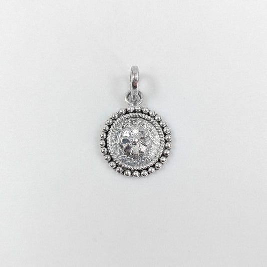 Floral Wheel Pendant - An elegant 925 sterling silver pendant by GetTheJuice, featuring a beautifully crafted floral wheel design that adds a touch of natural grace and charm to any look.