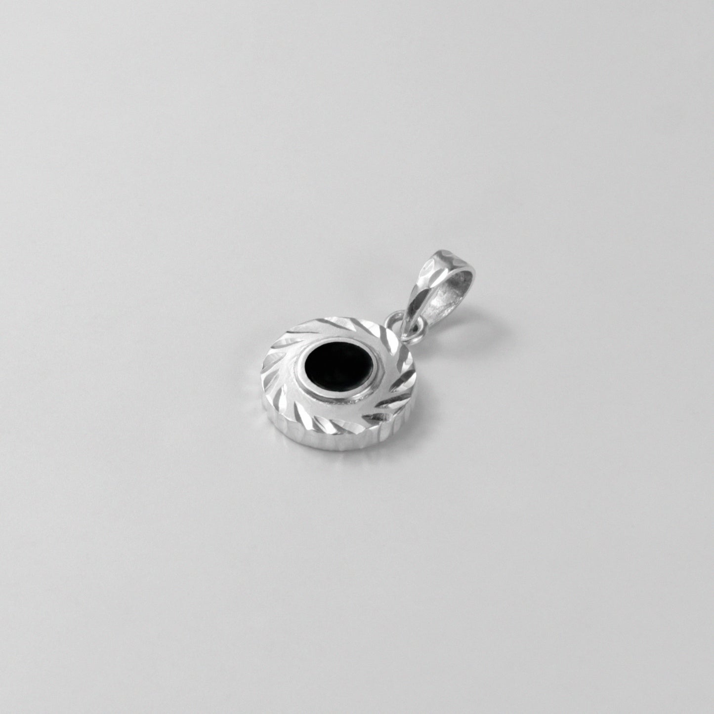 Midnight Eclipse Pendant - A stunning 925 sterling silver pendant by GetTheJuice, showcasing an intricate midnight eclipse motif that blends elegance with celestial allure.