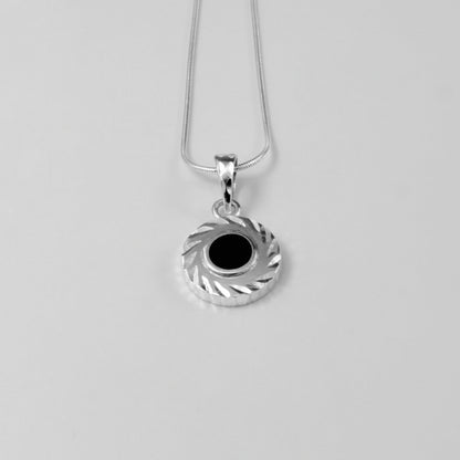 Midnight Eclipse Pendant - A stunning 925 sterling silver pendant by GetTheJuice, showcasing an intricate midnight eclipse motif that blends elegance with celestial allure.