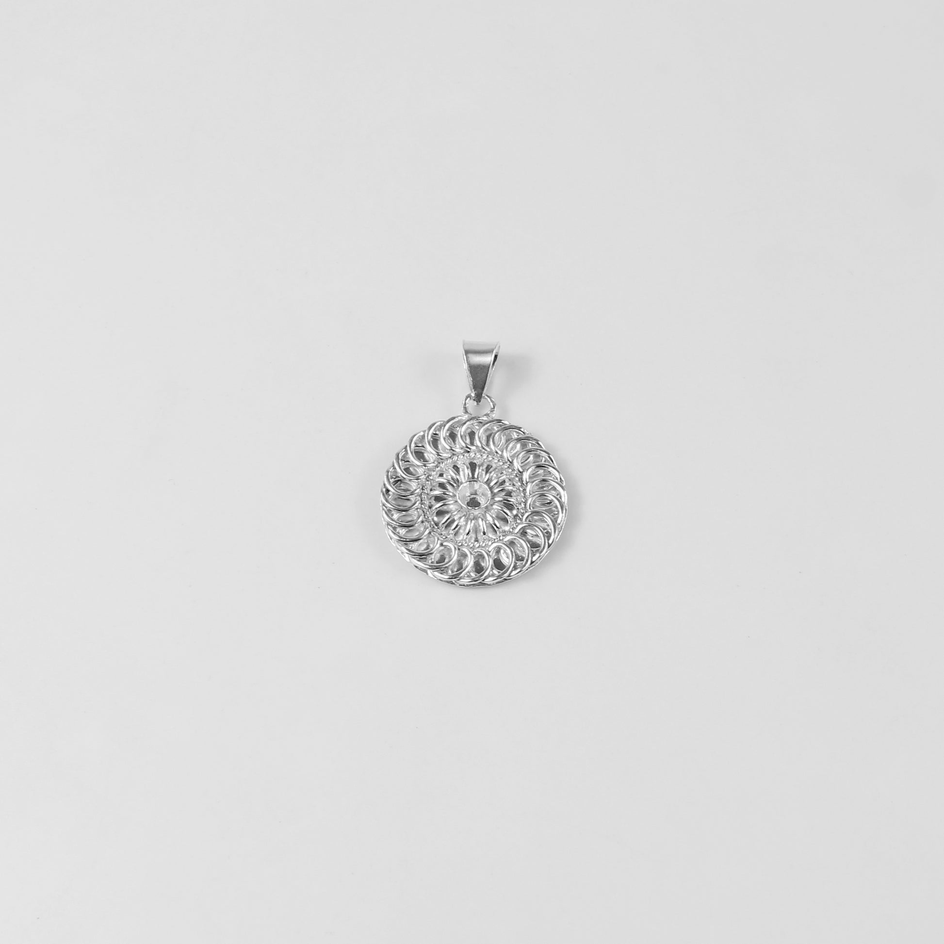 Mystic Whorl Pendant - An elegant 925 sterling silver pendant by GetTheJuice, featuring a mesmerizing spiral design that symbolizes mystery and allure, adding a touch of enigmatic beauty to any look.