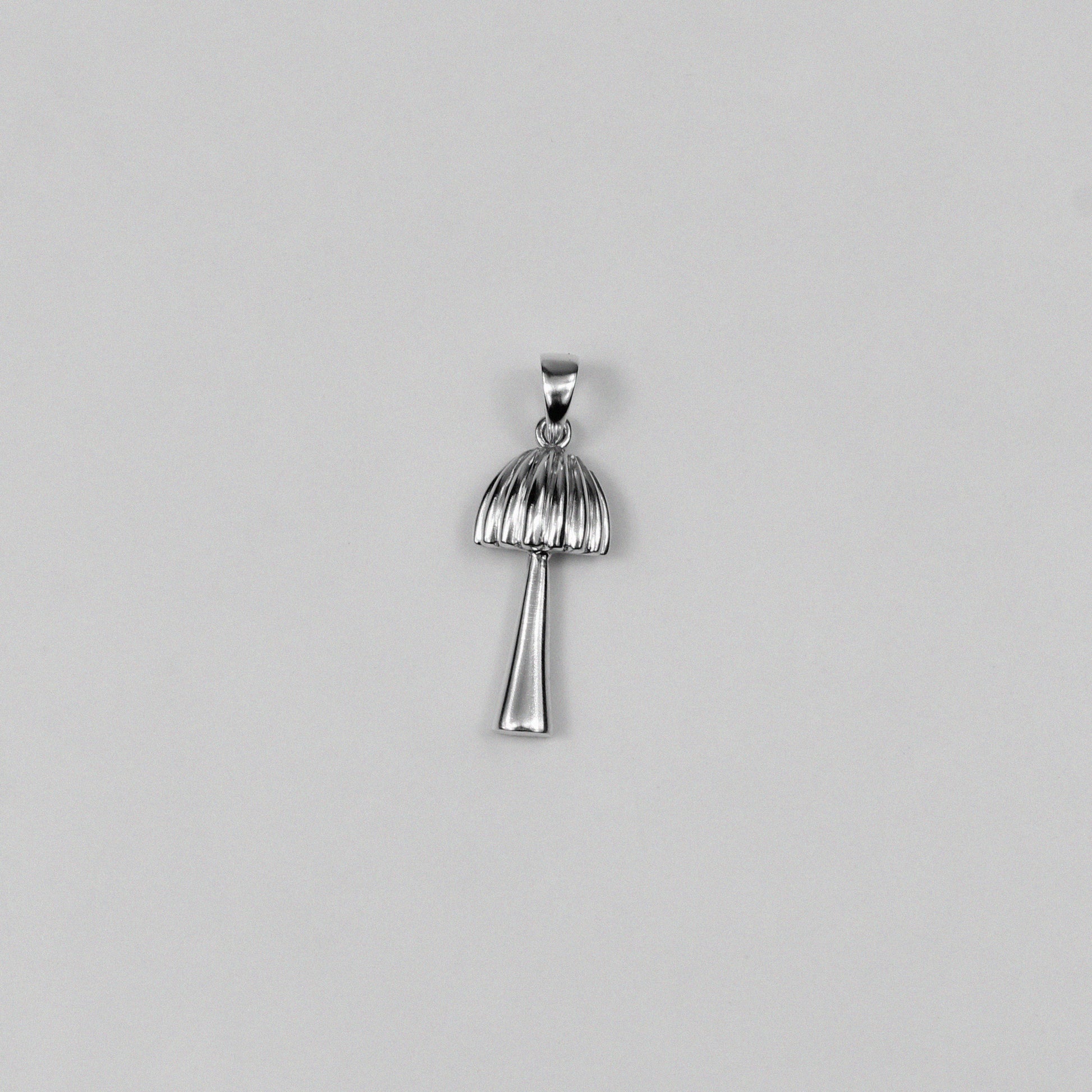 Shroom Pendant - An exquisite 925 sterling silver pendant by GetTheJuice, featuring a whimsical mushroom design that adds a touch of playful elegance and charm to any look.